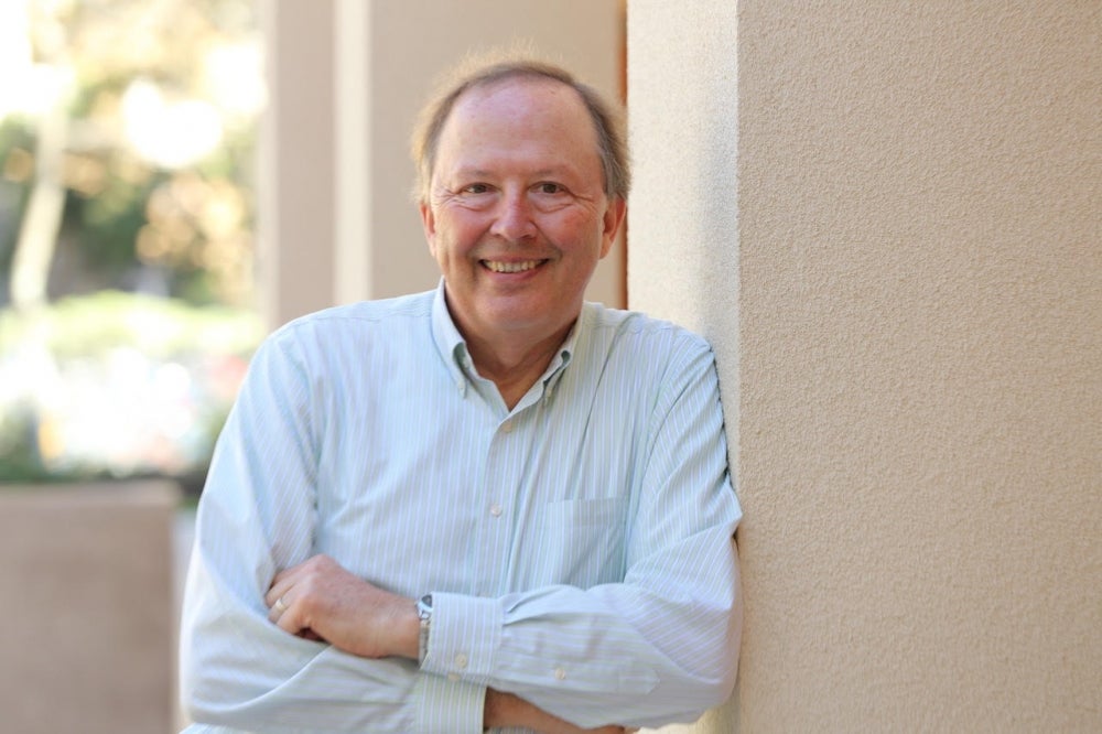 David Tilman in light blue shirt