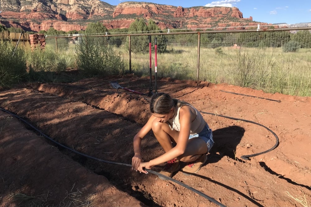 Visala Tallavarjula installs irrigation in Sedona, Arizona