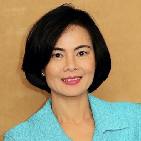 Thuc-Quyen Nguyen wears a light blue blazer