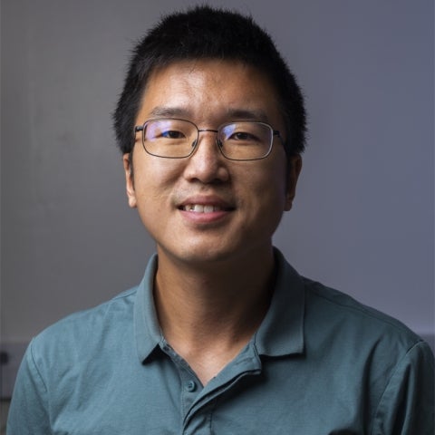 Bolin Liao wears a polo shirt