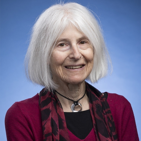 Eileen Boris wears a dark red top