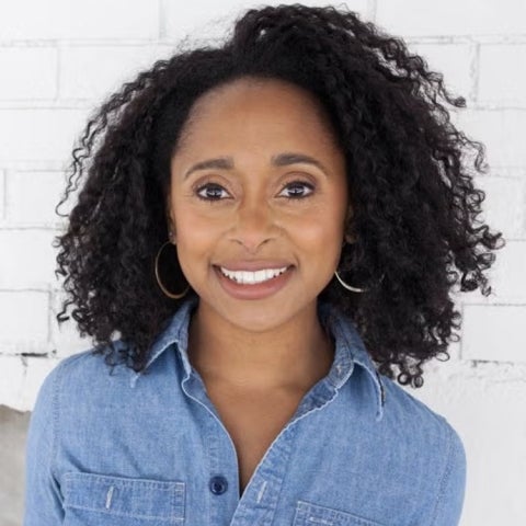 Rae Wynn-Grant wears a denim shirt