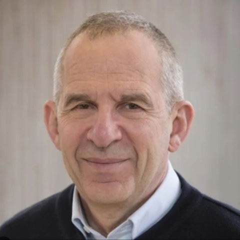 Michel Devoret wears a dark sweater and a collared shirt