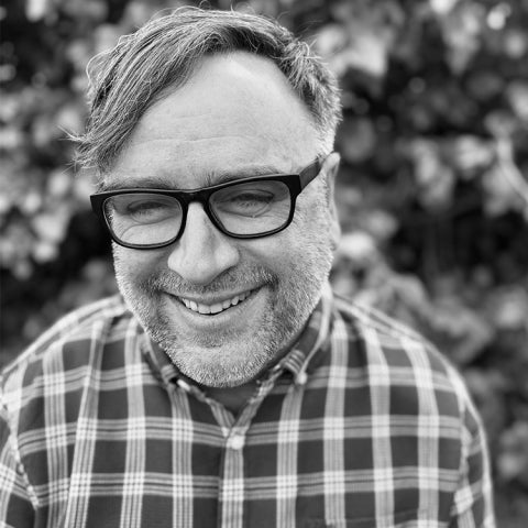 Robert Krut smiles outside