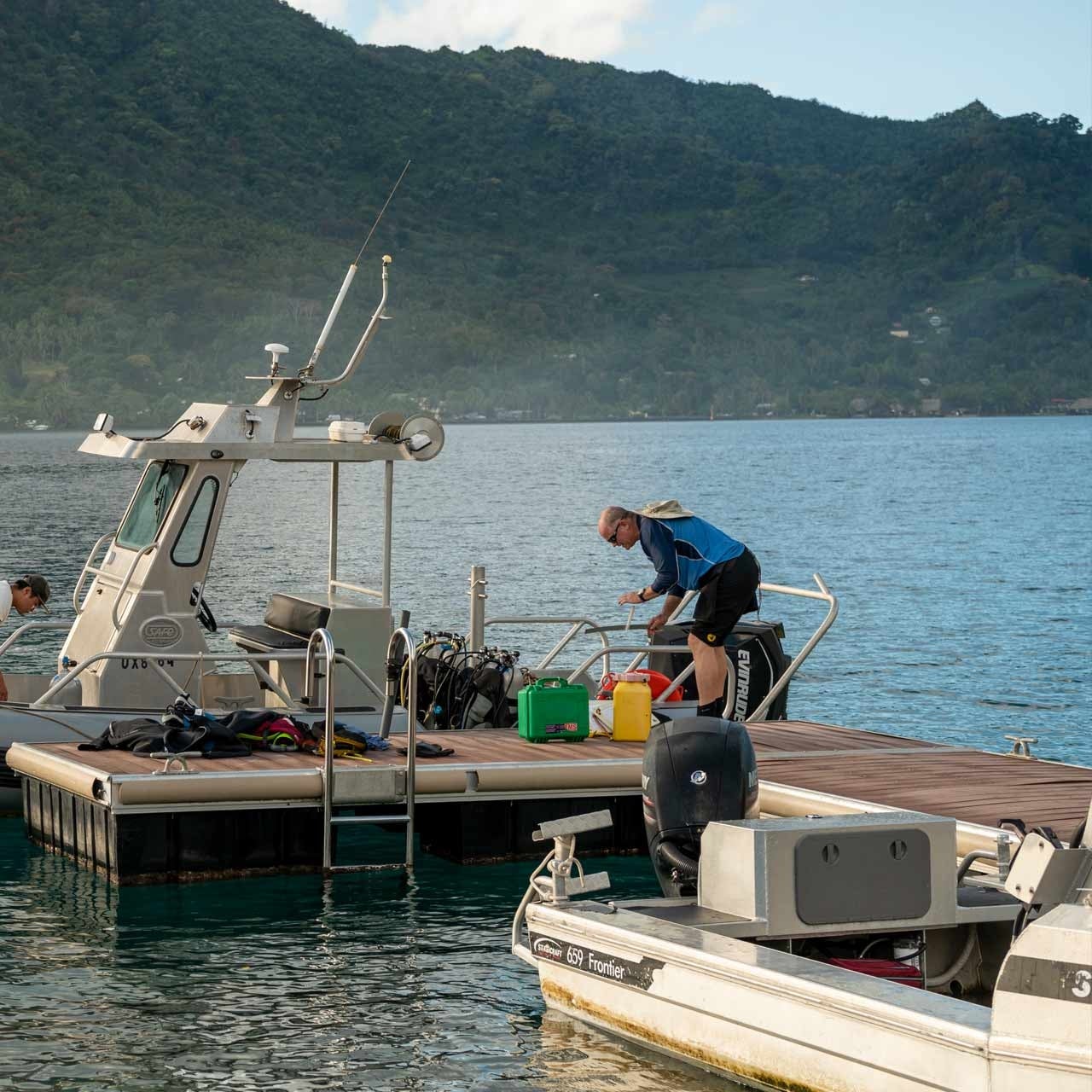 Hunter Lenihan prepping a boat