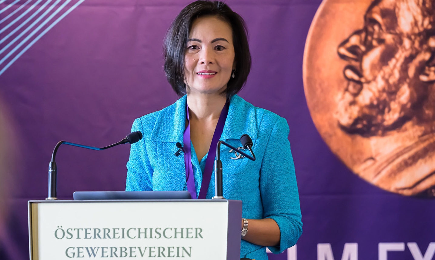 Professor Nguyen behind a lectern at the Wilhelm Exner Medal ceremony.