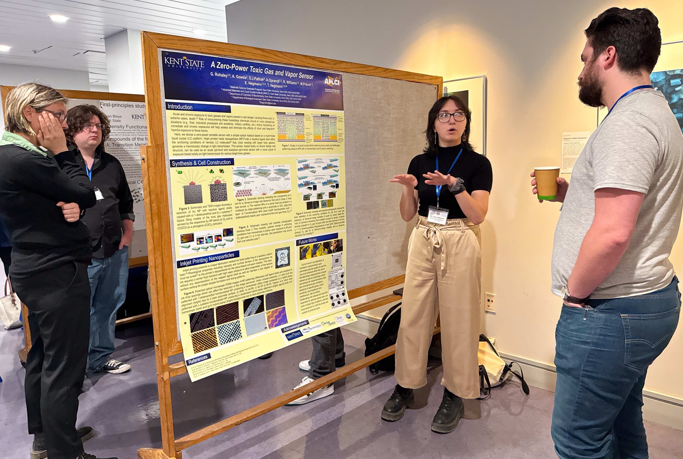scientists discussing projects at a poster session
