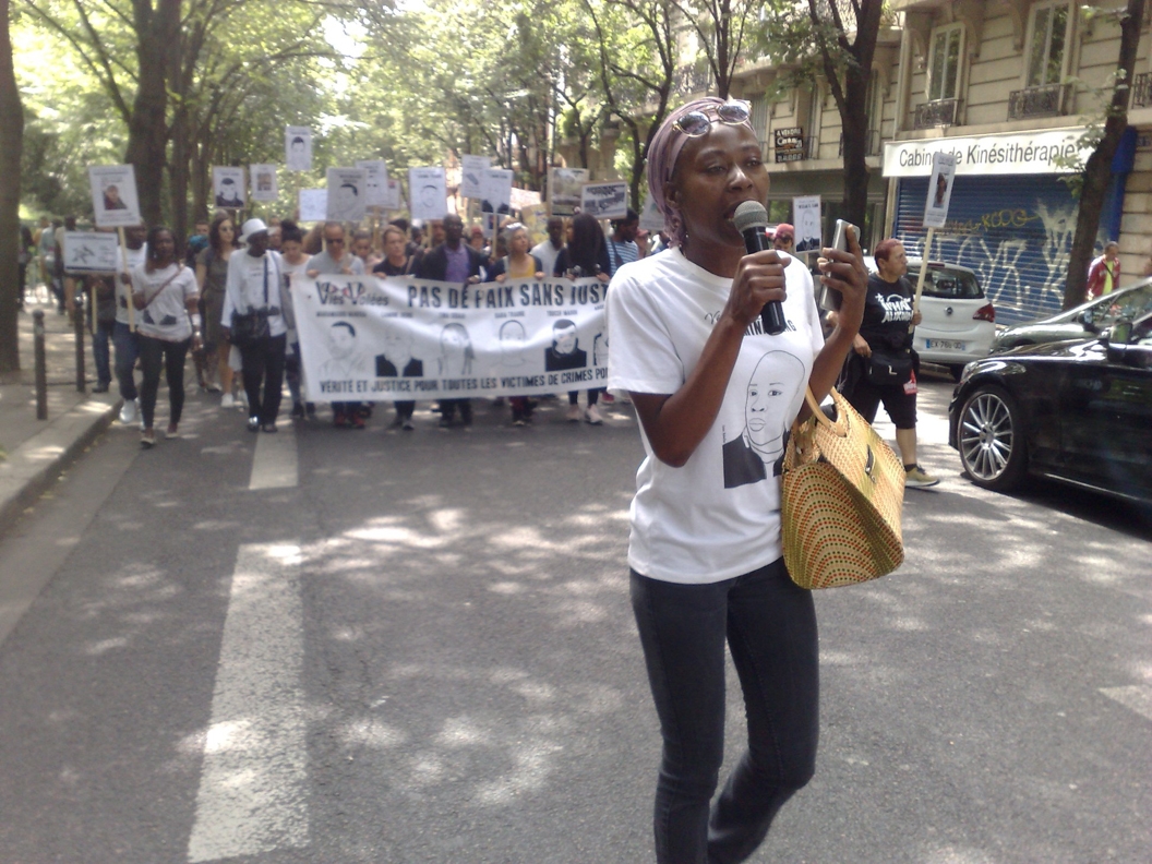 Black woman leads demonstration on street