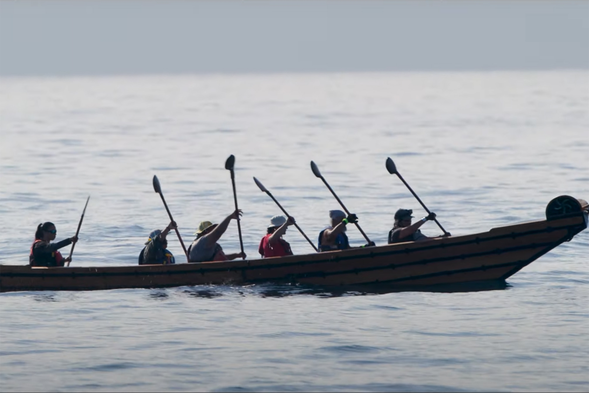 Photo of Chumash tomol paddlers in the Santa Barbara Channel