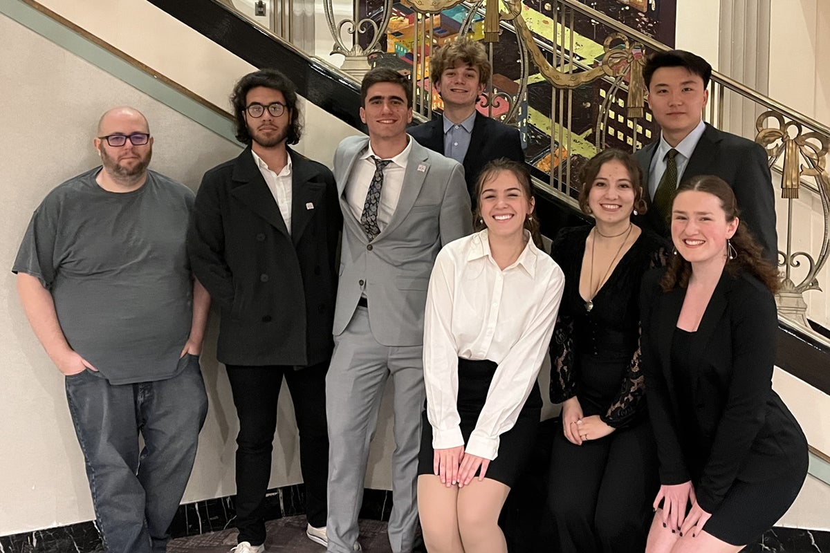 group shot of Ethics Bowl Team with coaches