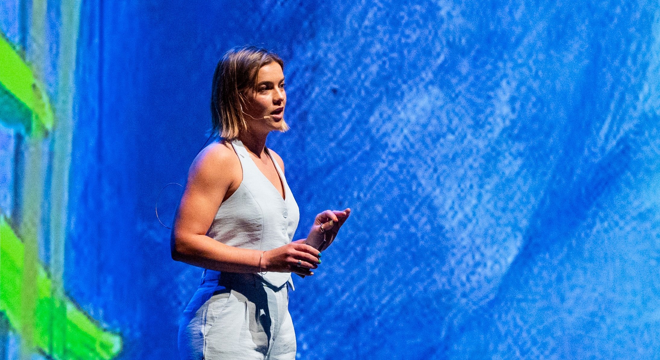 kacie ring with blue background young white woman