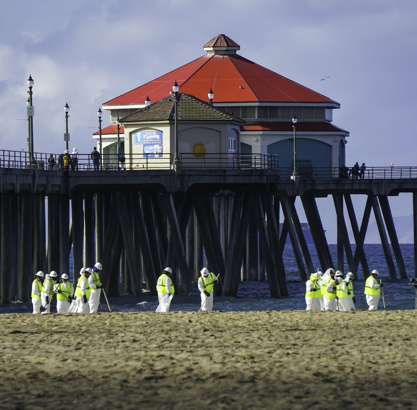 cleanup crew at the Huntington Beach pier