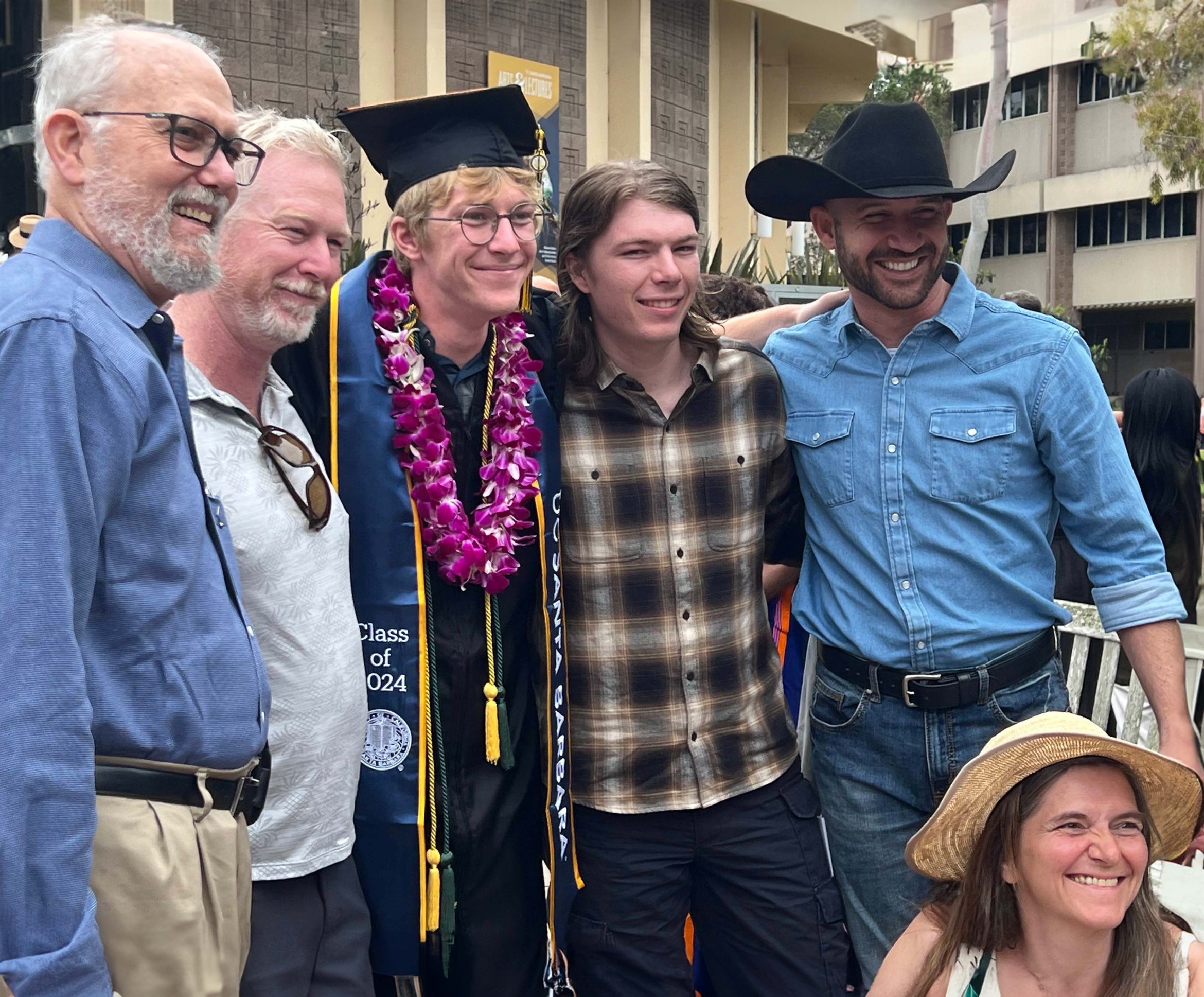 family posing with new CCS grad