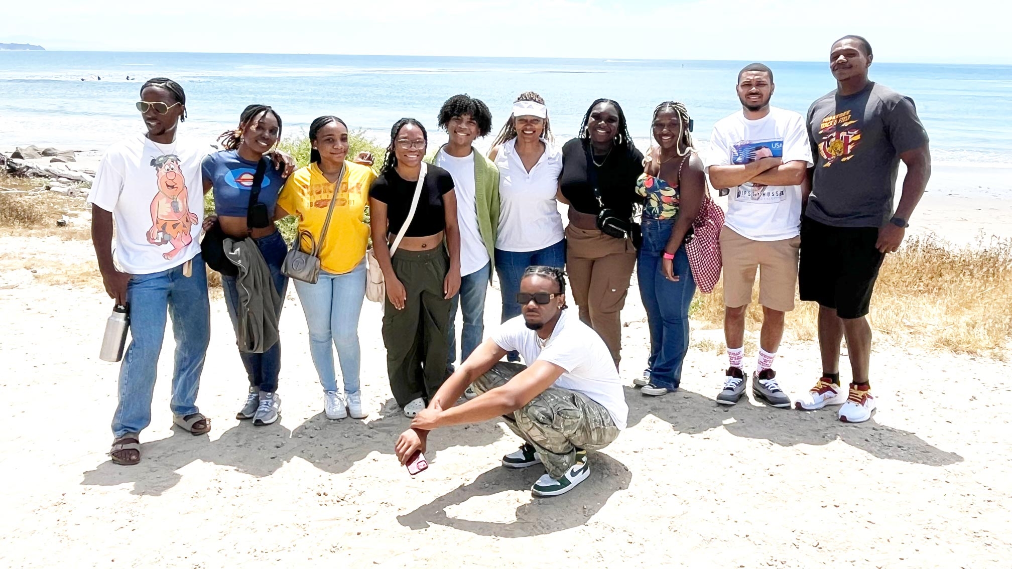 a group of students at the beach