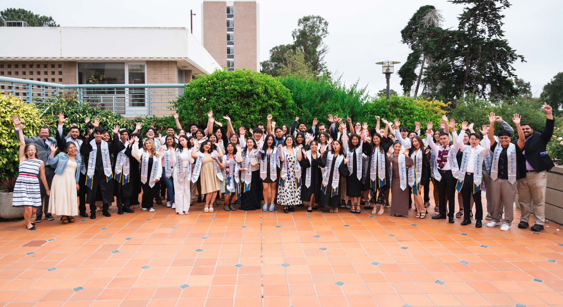 students with graduation regalia