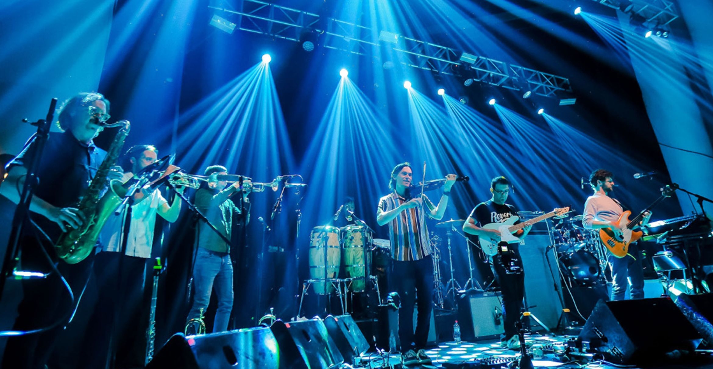 color photograph of the band snarky puppy on stage