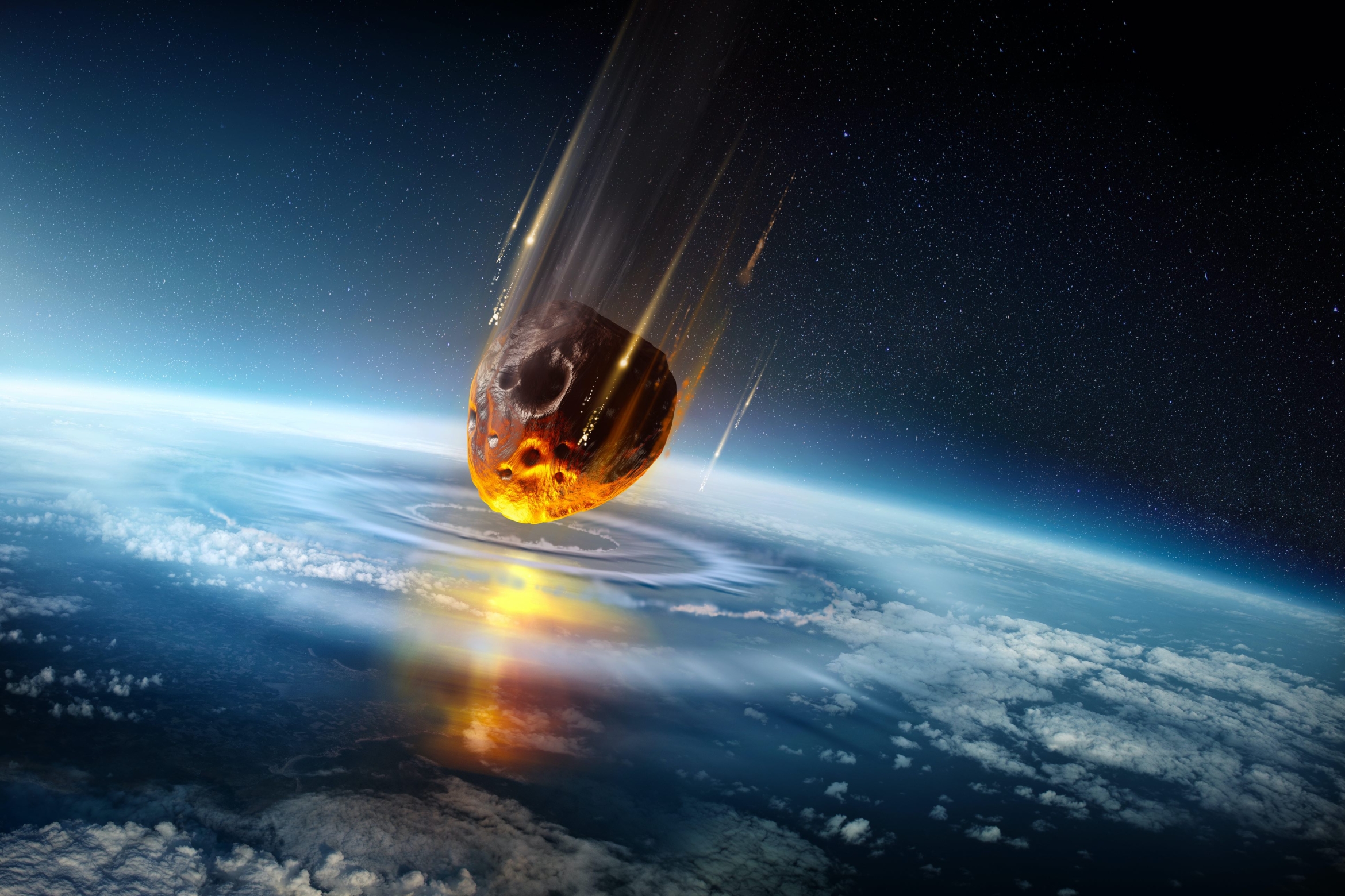 artist rendition of asteroid hitting Earth's atmosphere