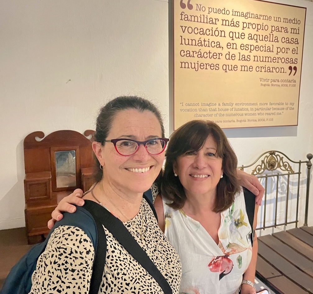 two women smiling at camera