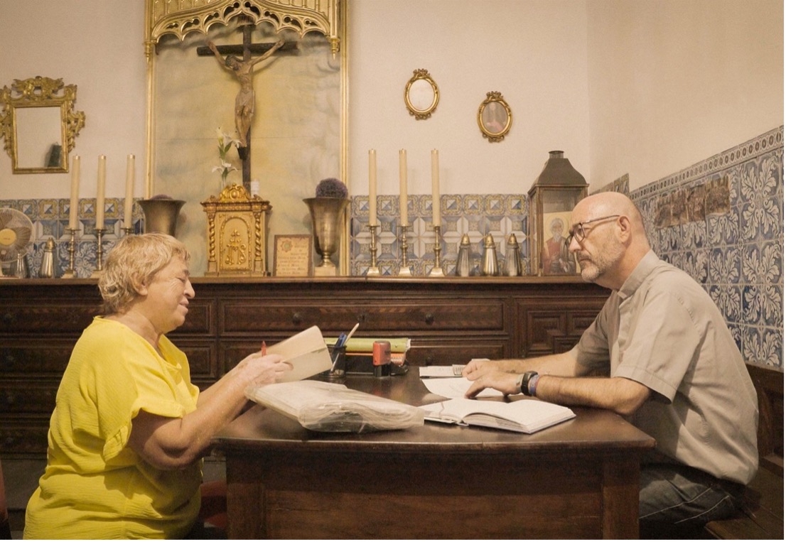 researchers inspecting parish records