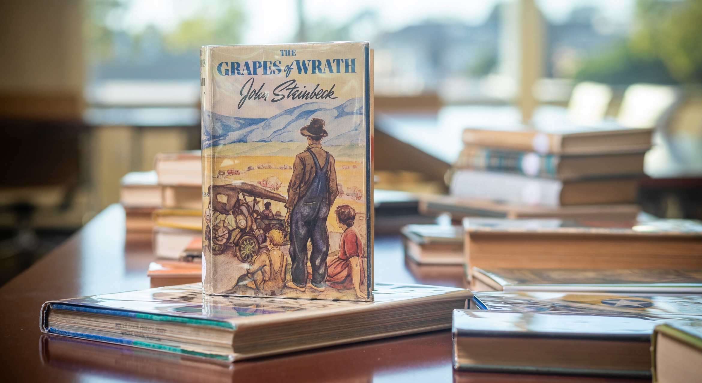 photograph of a first edition copy of the novel "The Grapes of Wrath" 