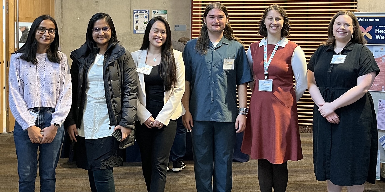 a group shot of six graduate students who competed at Grad Slam