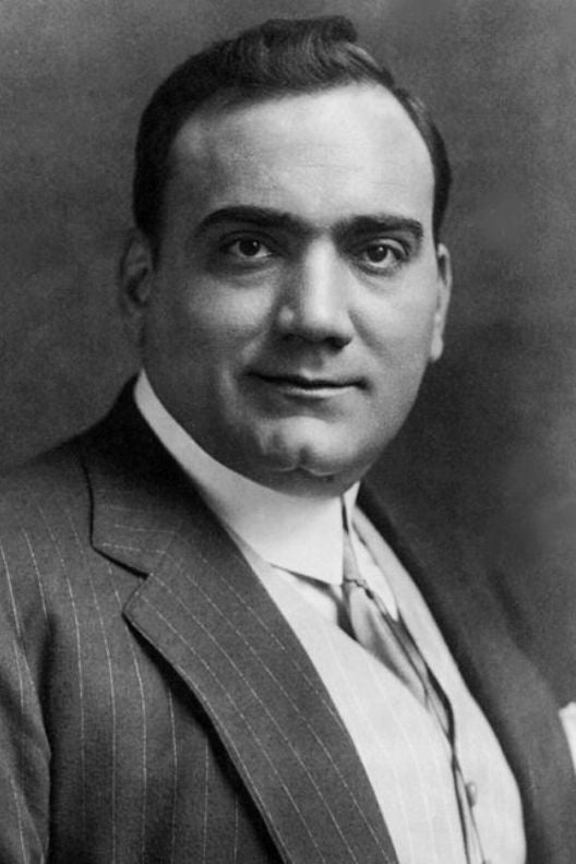 black and white portrait of opera singer Enrico Caruso
