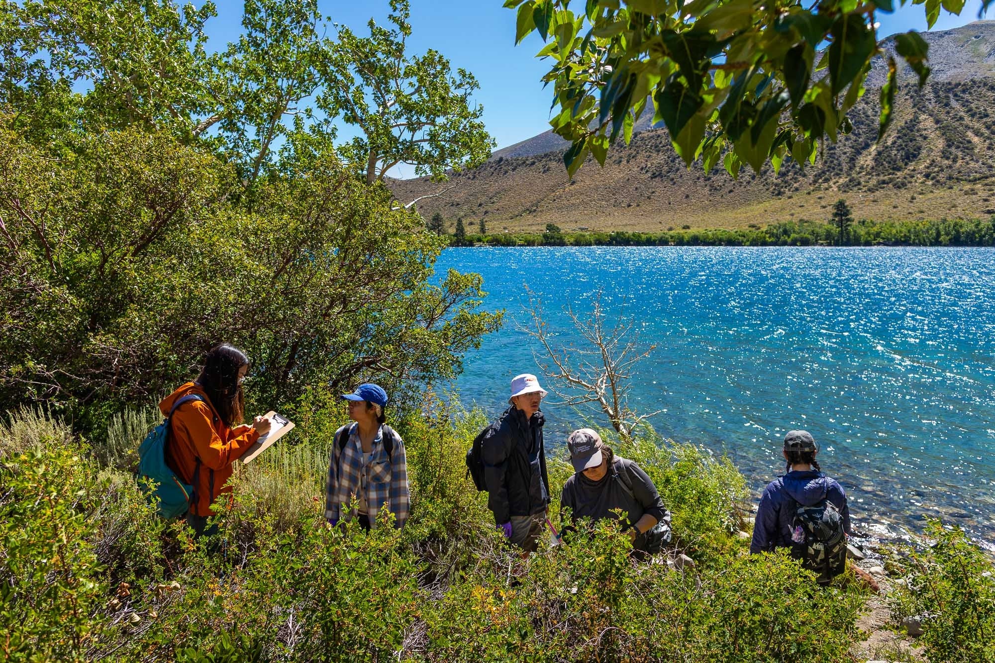 students with Convict Lake and beautiful blue water
