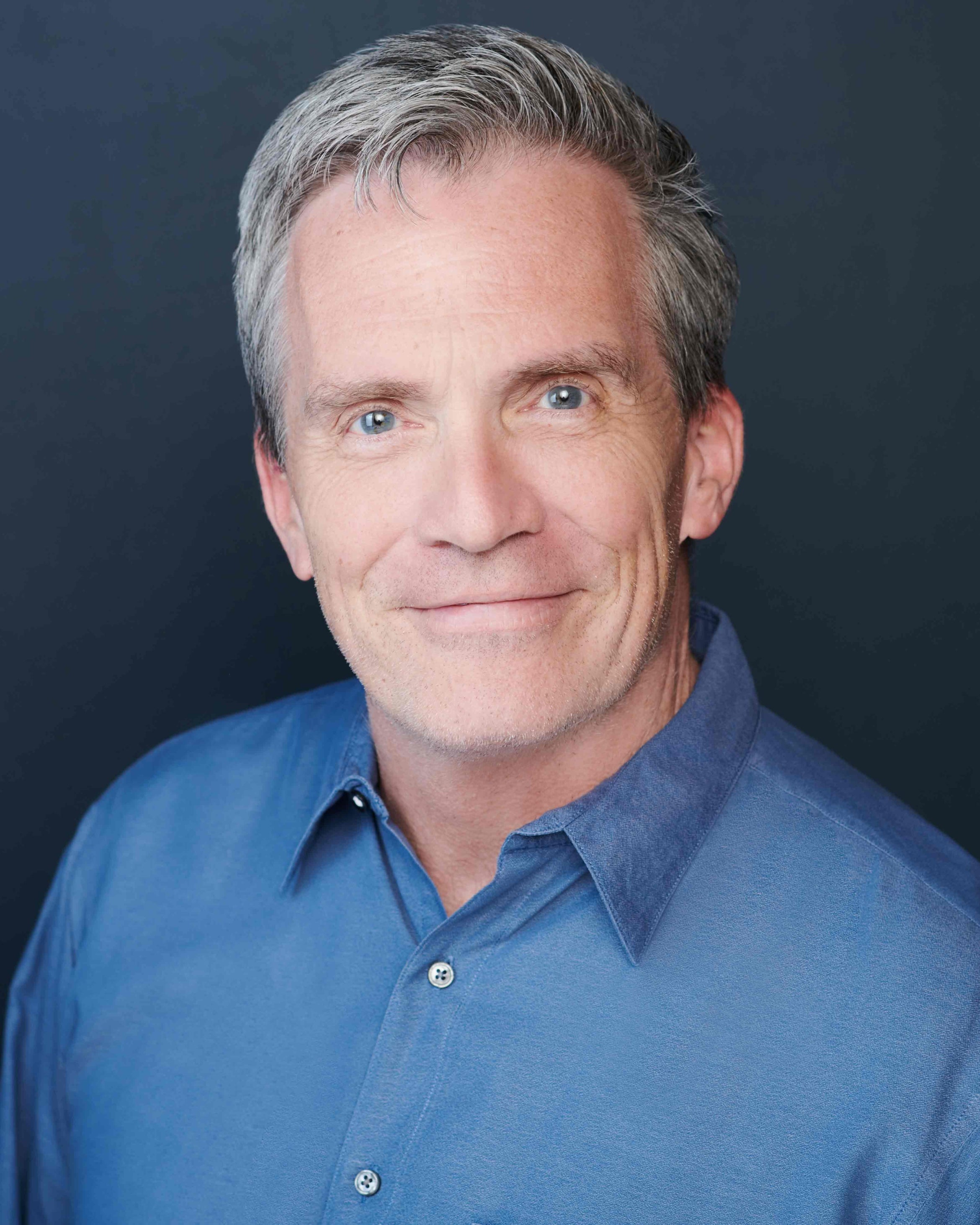 white man in a blue shirt