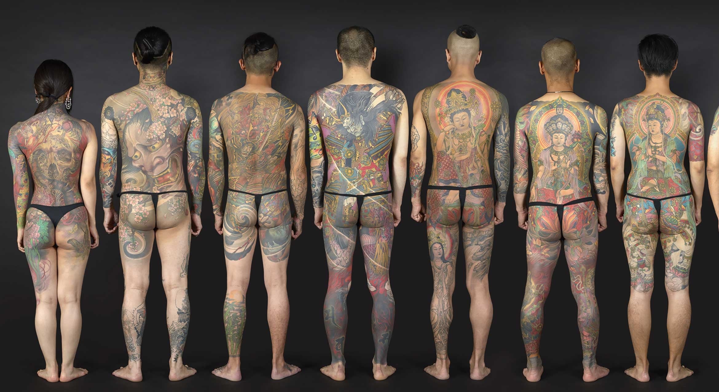 men from behind with full body Japanese tattoos
