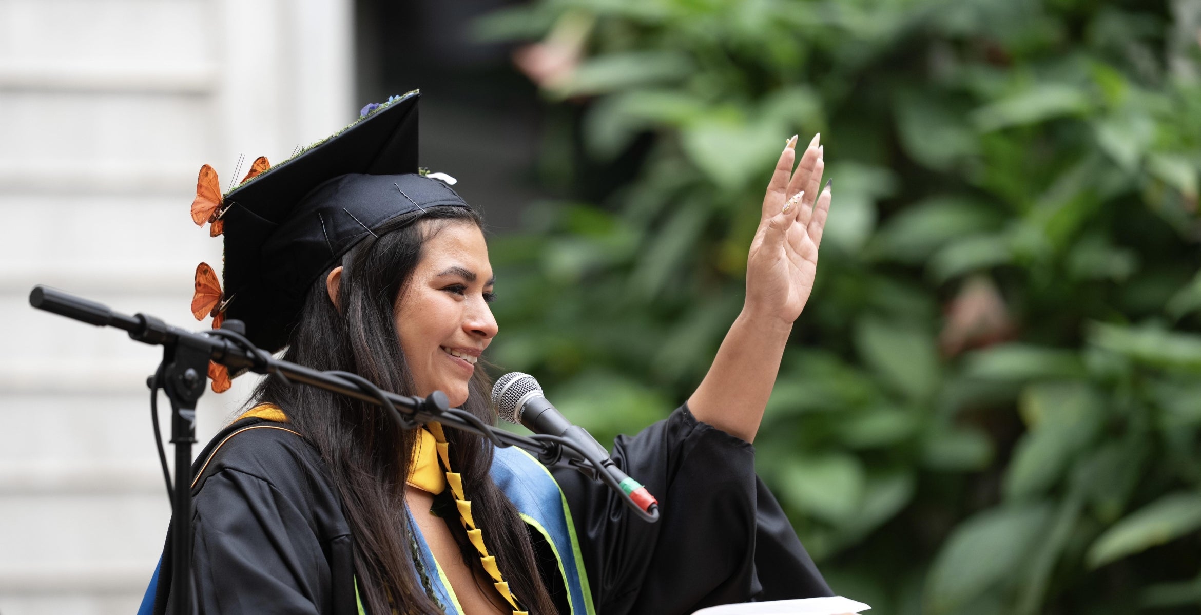 Sabrina Molina Ramos addresses her fellow graduates.