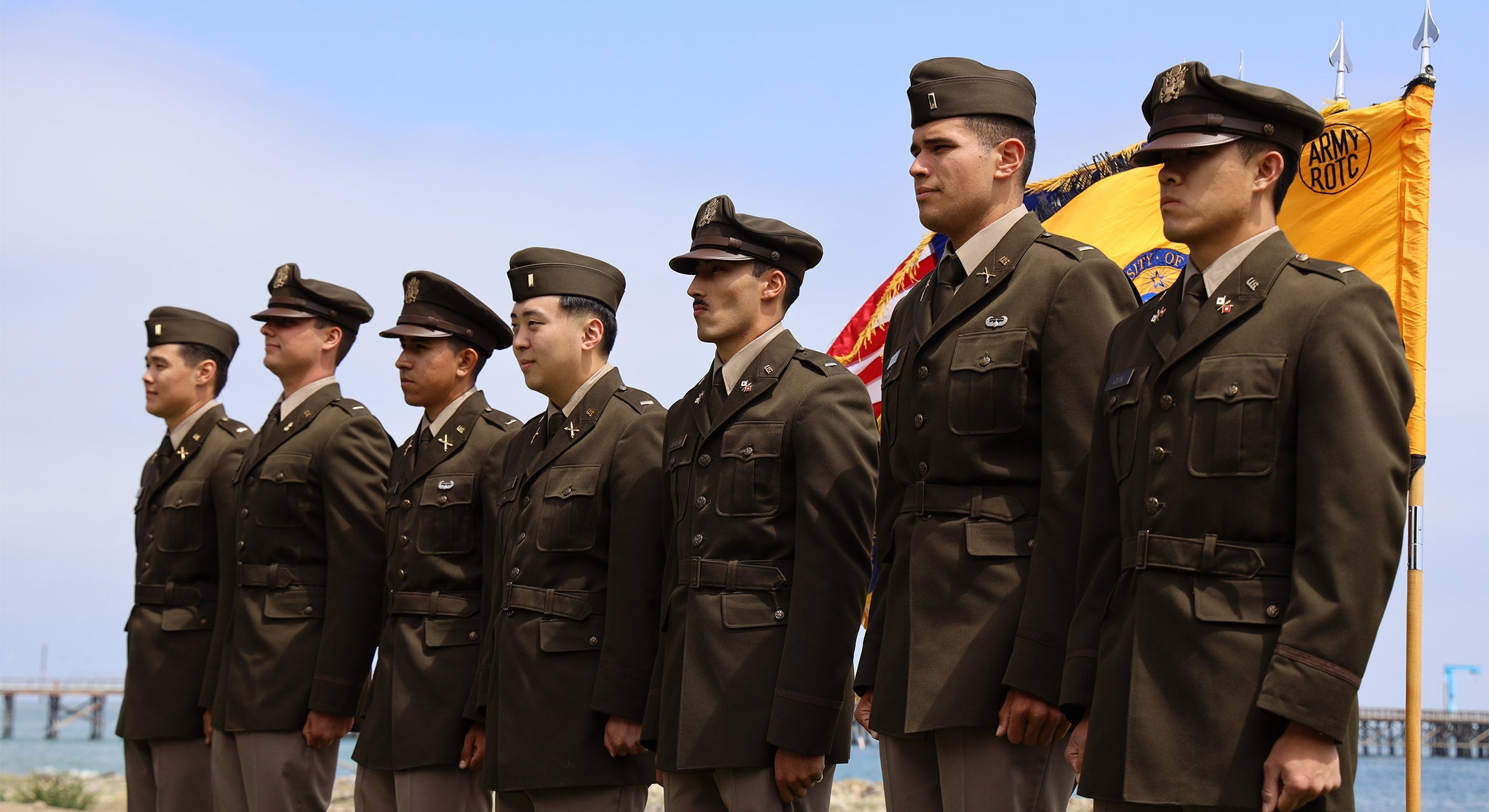 seven newly commissioned UCSB ROTC student stand in a row 