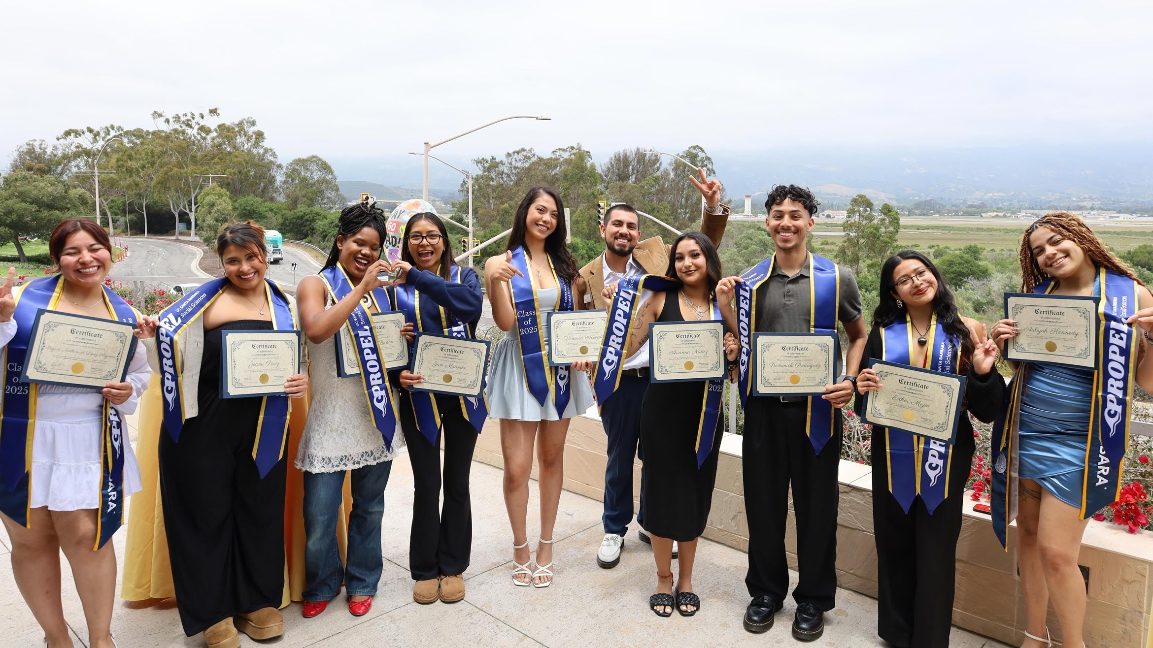 group of students with certificates