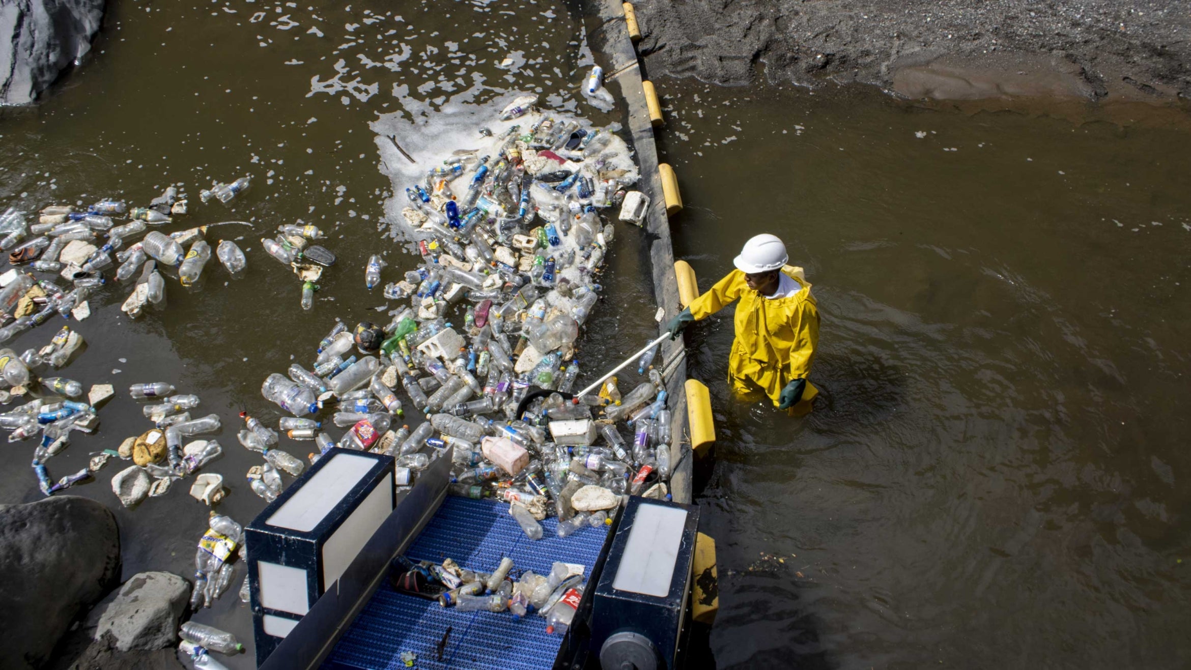 plastic bottles being filtered in water