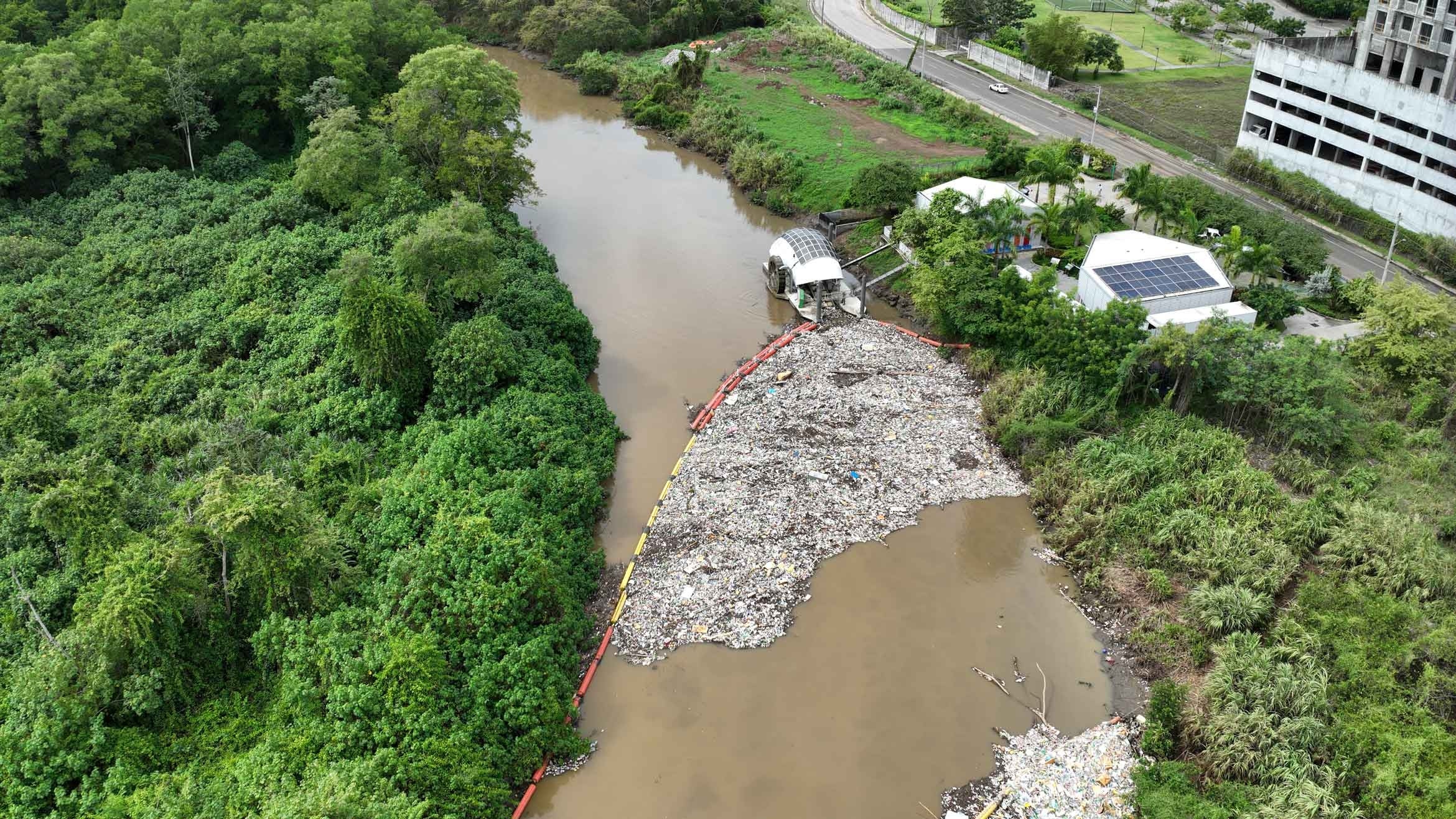 trash wheel filters plastic in river