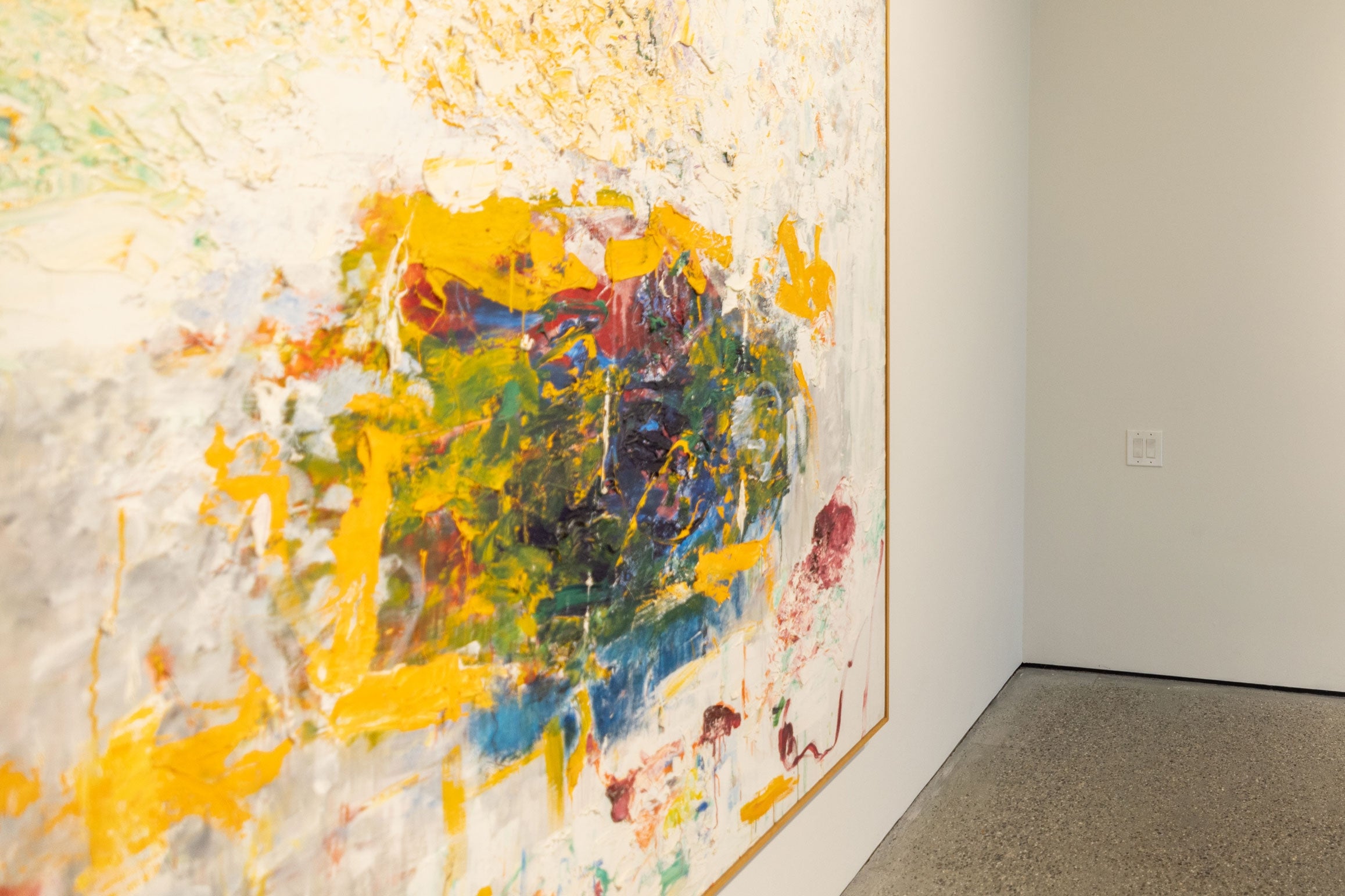 close up of abstract painting with yellow