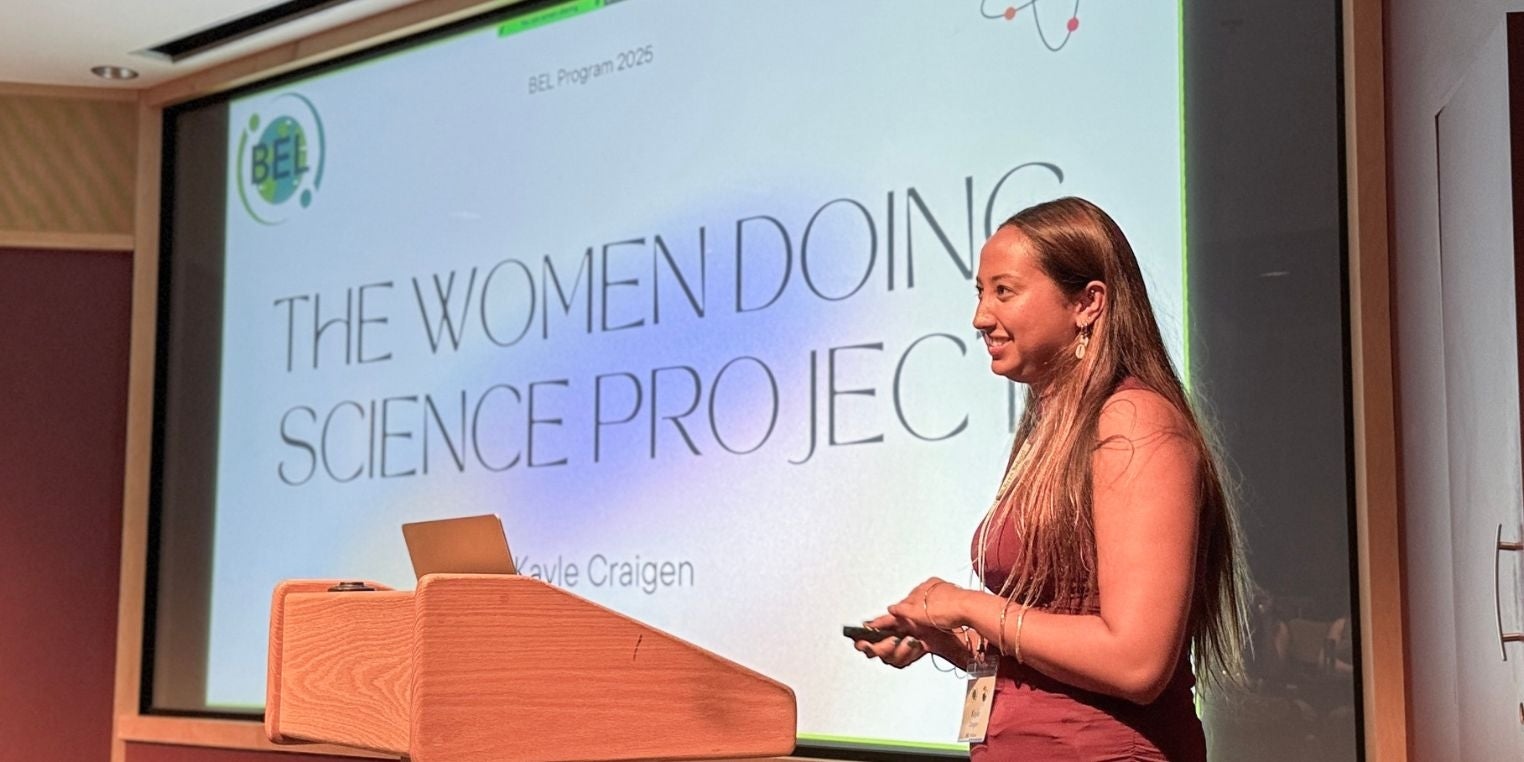 color photograph of studen kayle craigen presenting her project