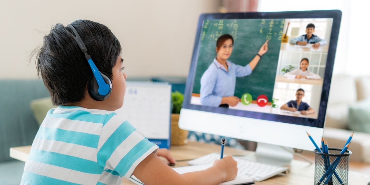 photo of a young boy in an online tutoring class 