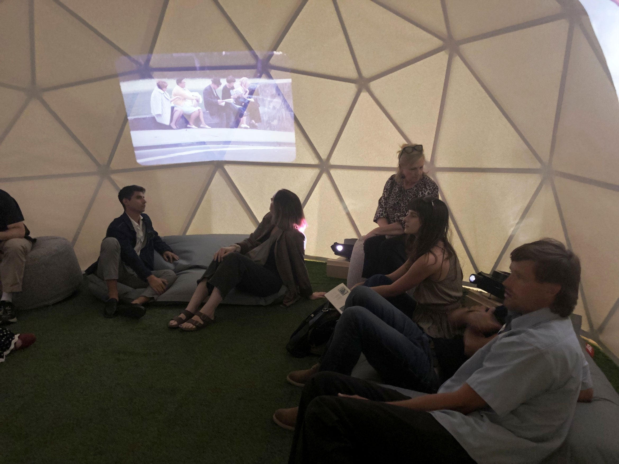 projection inside a dome with people