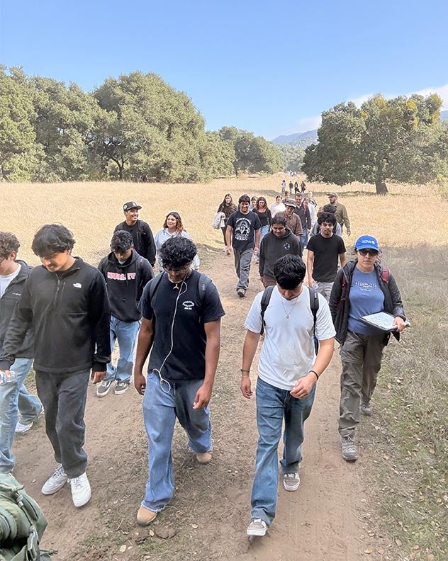high school students walking a trail on the Dangermond nature preserve