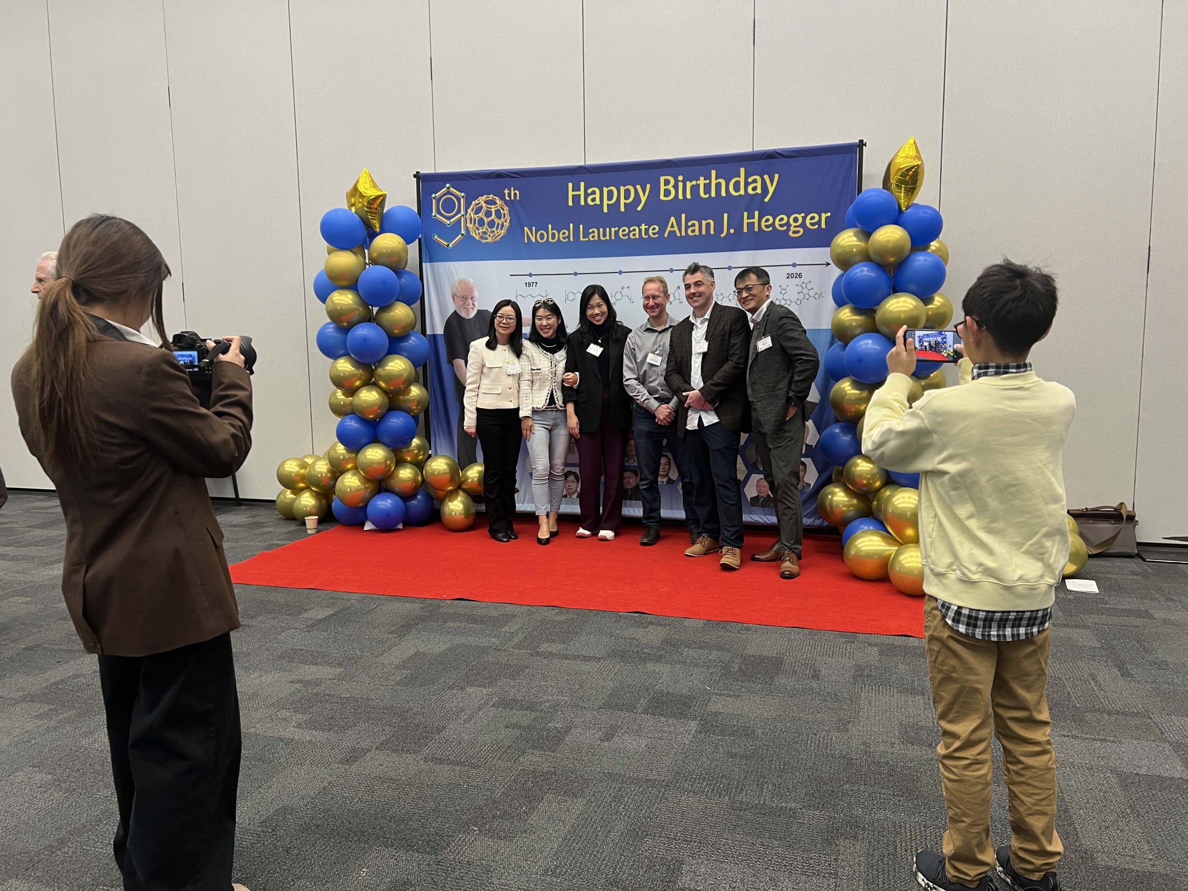 people taking picture of people