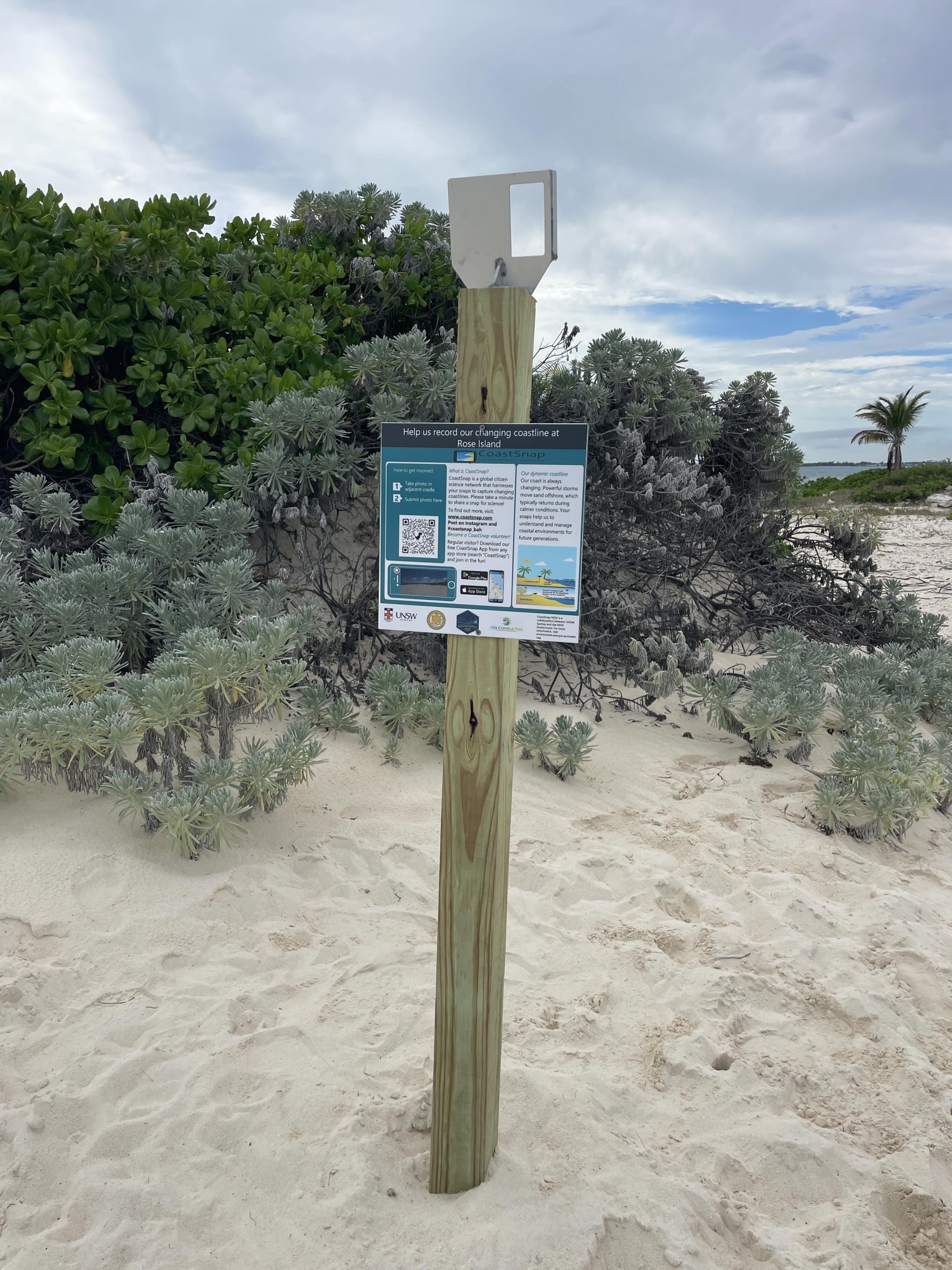 a post with a 'cradle' to hold smartphones in position