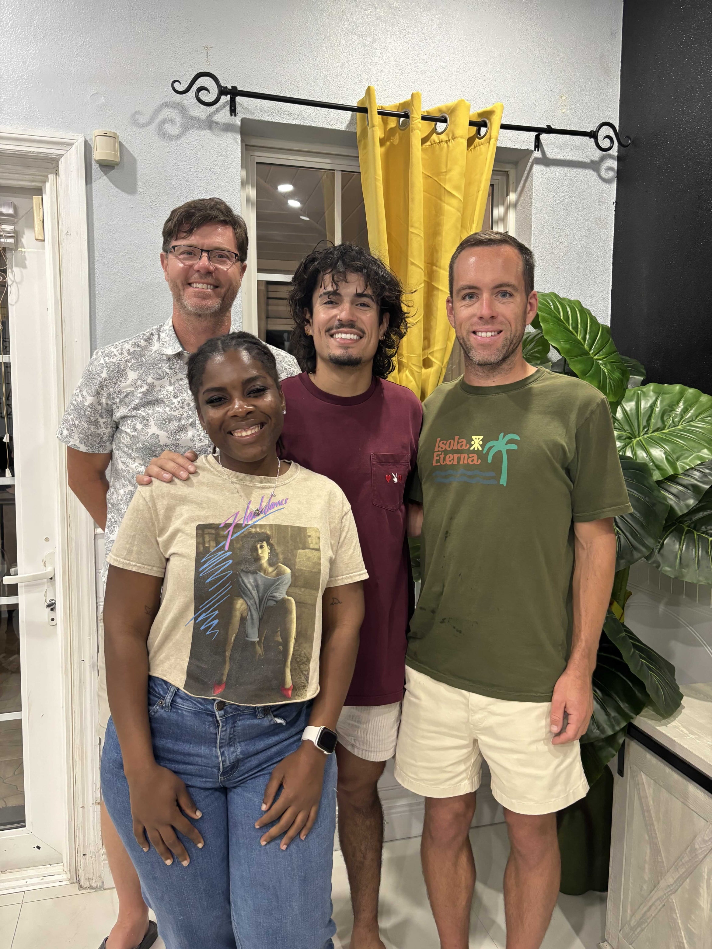 four researchers standing, posing for the camera