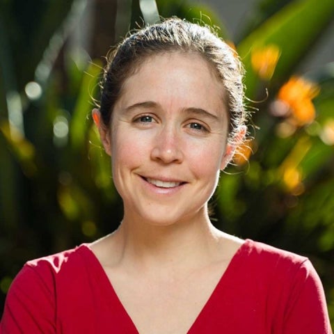 Anna Trugman in a red top