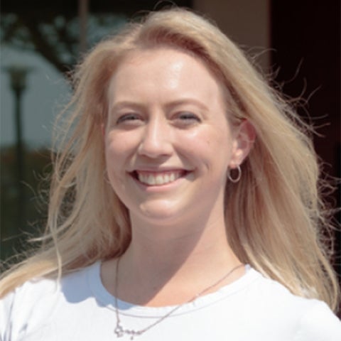 Kylie Falcione wears a white shirt outside