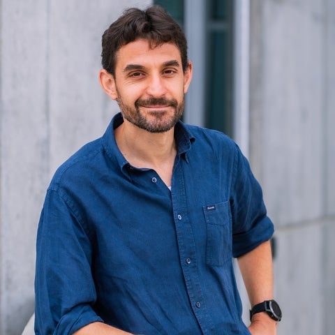 Omar Saleh wears a blue shirt