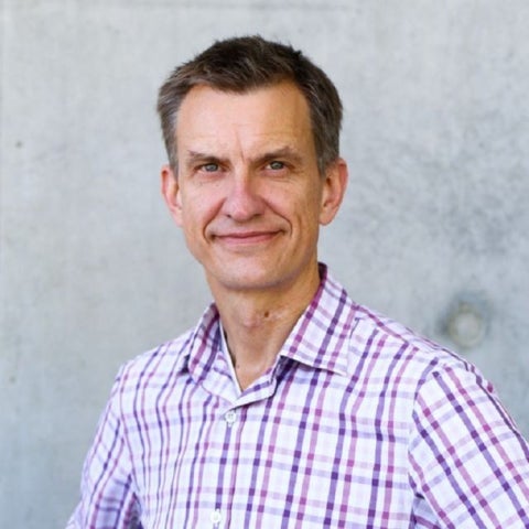 Yon Visell wears a checkered collared shirt